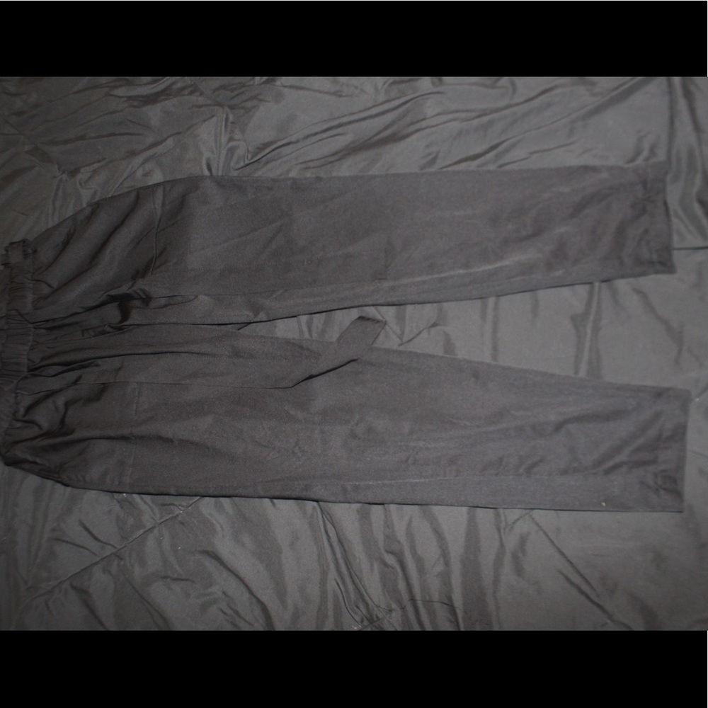 Black satin pants slightly used with a belt